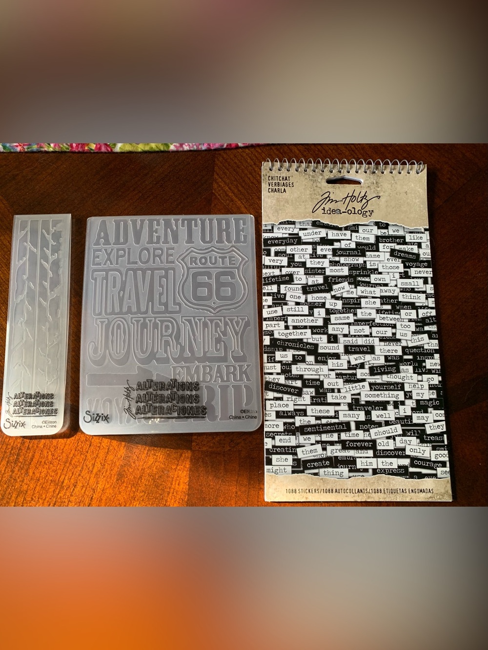 Tim Holtz Travel Word Embossing Folders & 1 Tim Holtz Idea-ology sticker book.